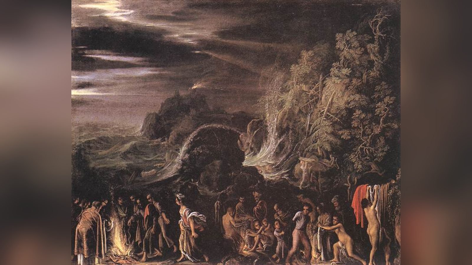 Pintura nocturna de un naufragio en una costa rocosa con un cielo tormentoso; náufragos se reúnen en torno a una hoguera en la orilla
